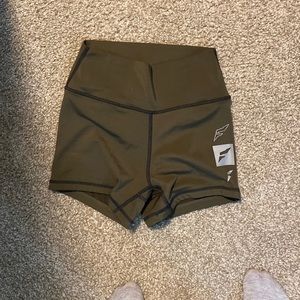 Green compression shorts